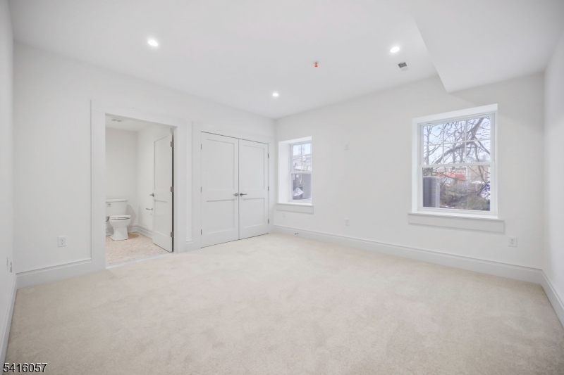 1209 Littleton Road, Unit A Morris Plains, NJ 07950 - Photo 15 of 23 a view of an empty room with a window