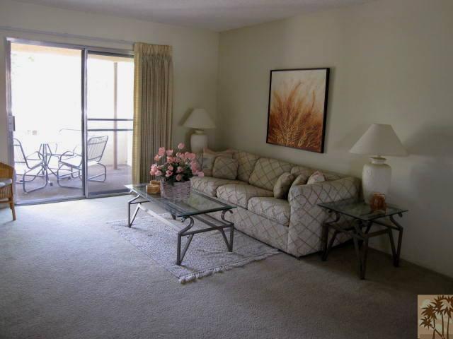1268 Ramon Road, Unit 52 Palm Springs, CA 92264 - Photo 2 of 22 a living room with furniture and a window