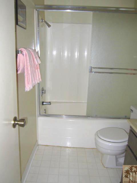 1268 Ramon Road, Unit 52 Palm Springs, CA 92264 - Photo 14 of 22 a bathroom with a toilet and a shower