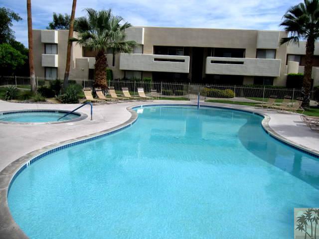 1268 Ramon Road, Unit 52 Palm Springs, CA 92264 - Photo 21 of 22 a view of a swimming pool with outdoor seating