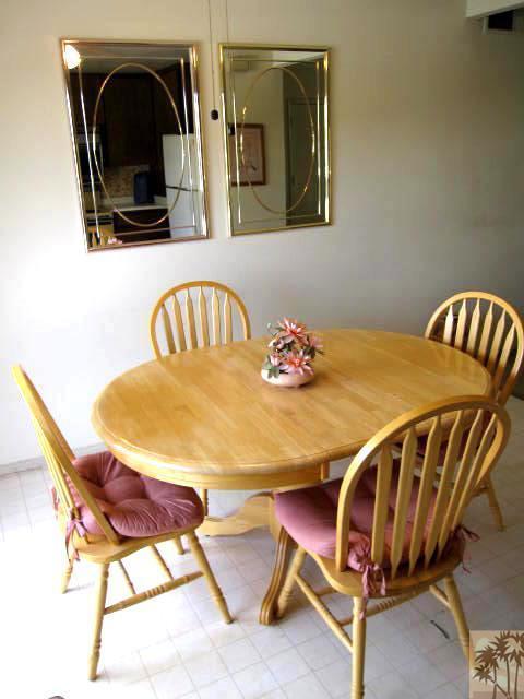 1268 Ramon Road, Unit 52 Palm Springs, CA 92264 - Photo 6 of 22 a view of a dining room with furniture