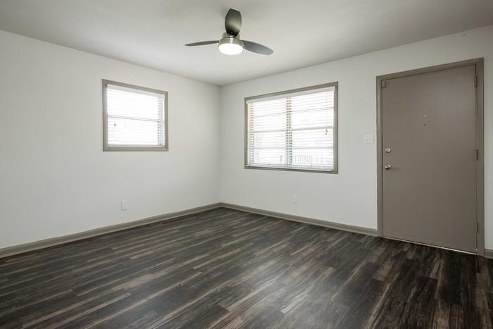 921 Myrtle Street Northeast, Unit MYRT006 Atlanta, GA 30309 - Photo 15 of 21 a view of an empty room with wooden floor and a window
