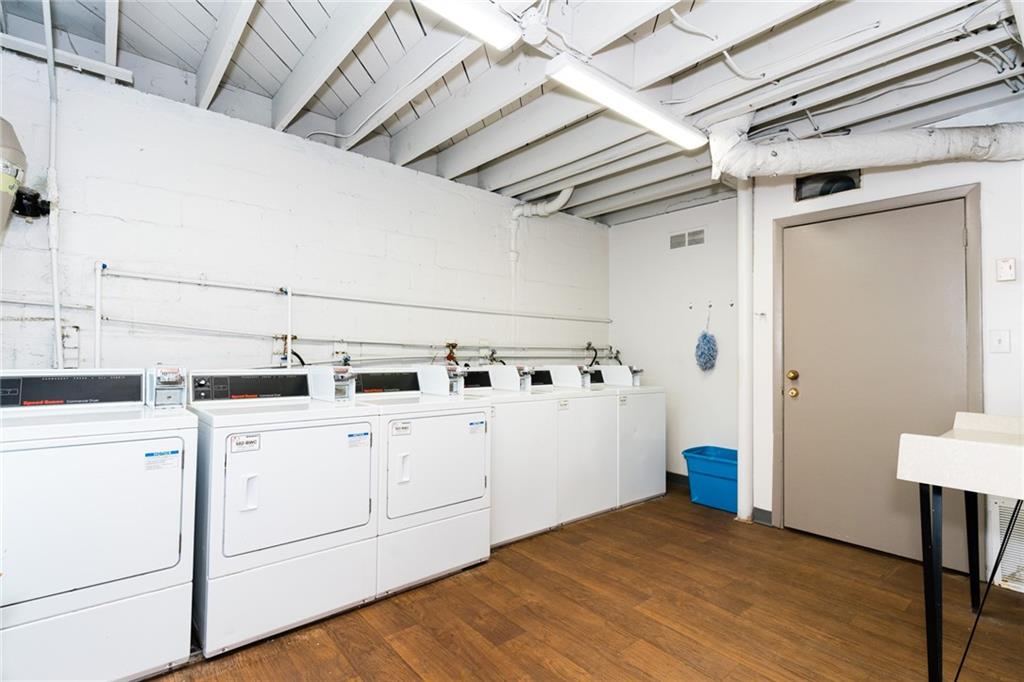 921 Myrtle Street Northeast, Unit MYRT006 Atlanta, GA 30309 - Photo 20 of 21 a view of a storage & utility room with dryer and washer