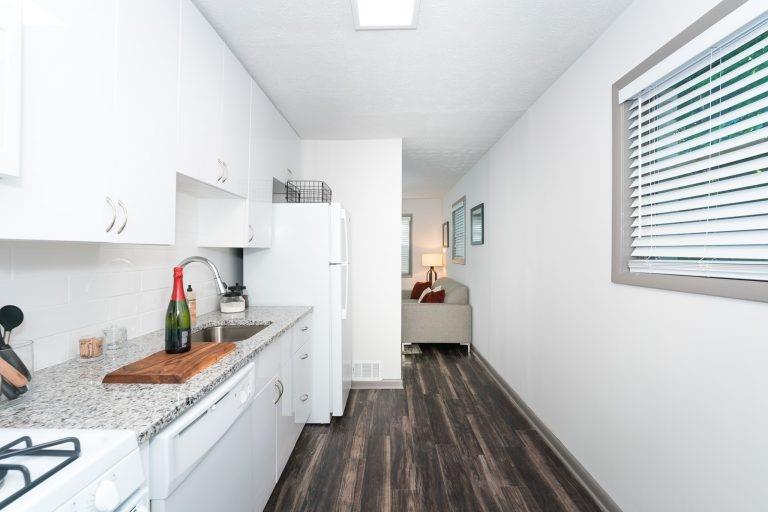 921 Myrtle Street Northeast, Unit MYRT006 Atlanta, GA 30309 - Photo 2 of 21 a kitchen with sink and cabinets