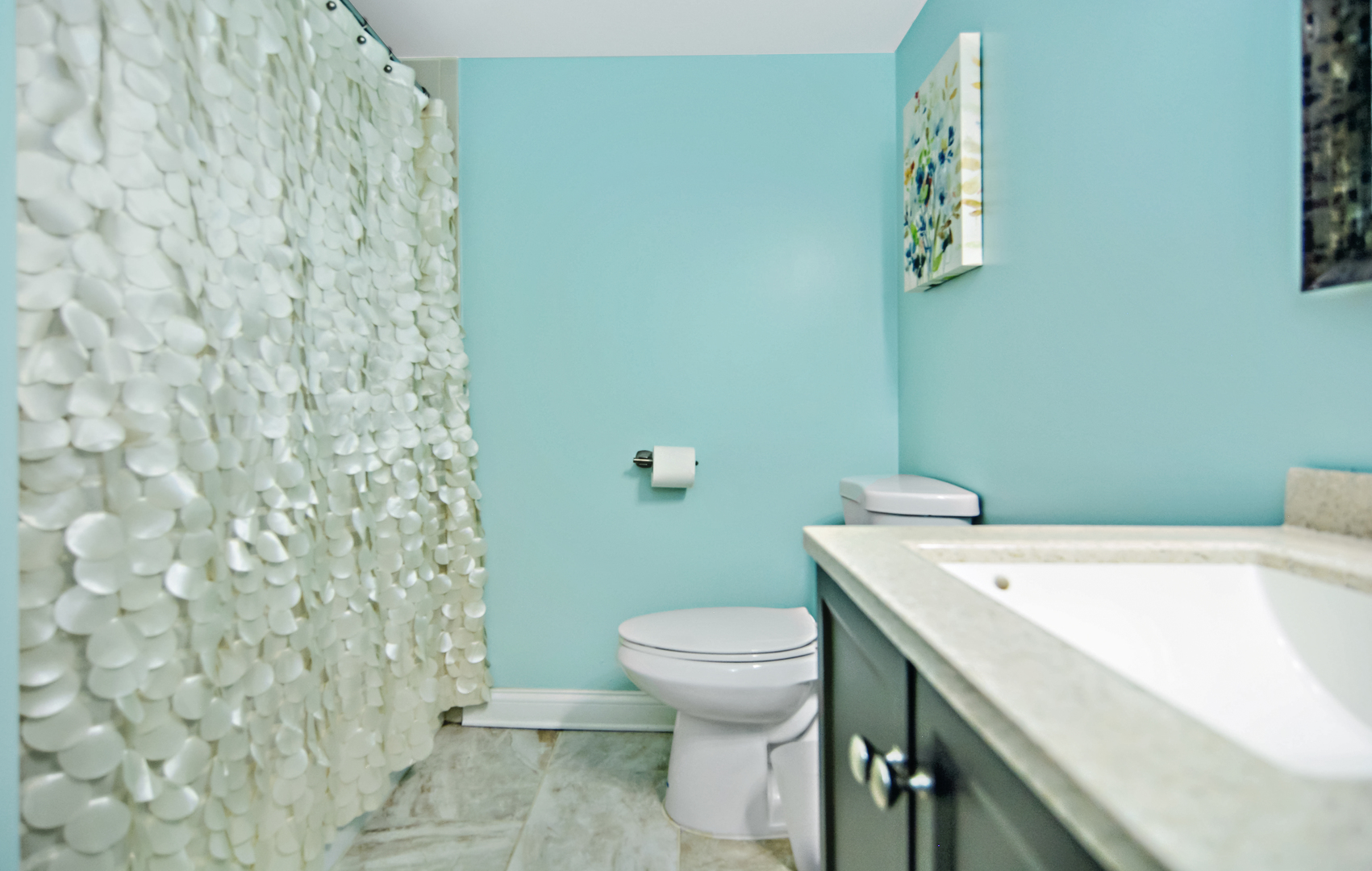 10630 Ridgeland Avenue, Unit 2A Chicago Ridge, IL 60415 - Photo 16 of 19 a bathroom with a sink and a toilet