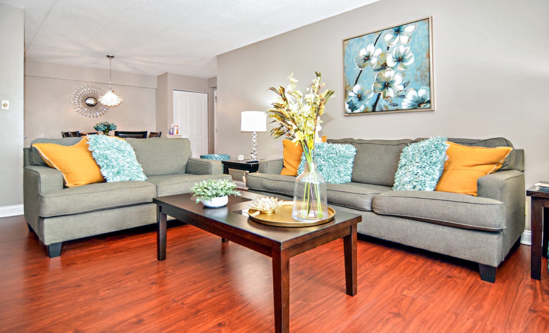 10630 Ridgeland Avenue, Unit 2A Chicago Ridge, IL 60415 - Photo 3 of 19 a living room with furniture and a wooden floor