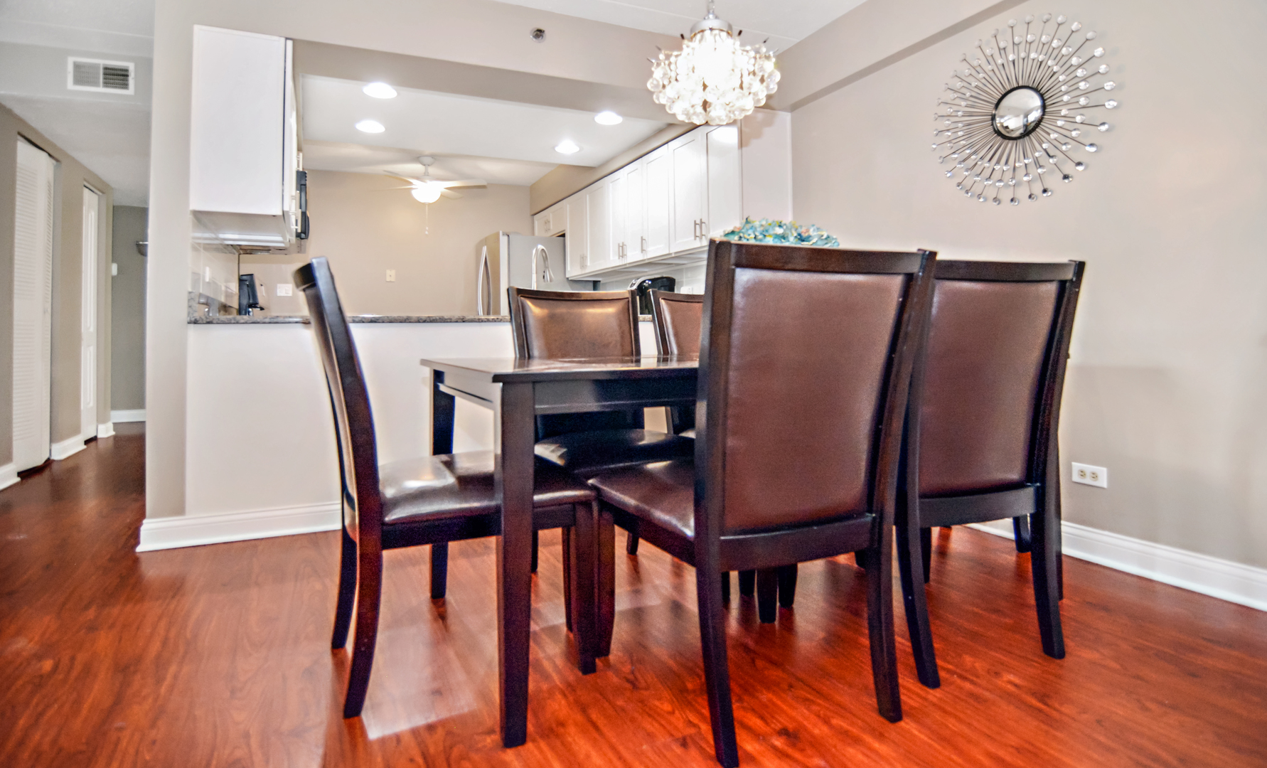 10630 Ridgeland Avenue, Unit 2A Chicago Ridge, IL 60415 - Photo 5 of 19 a view of a dining room with furniture and wooden floor