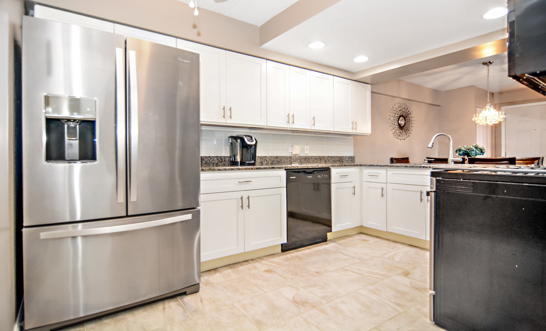 10630 Ridgeland Avenue, Unit 2A Chicago Ridge, IL 60415 - Photo 7 of 19 a kitchen with stainless steel appliances a refrigerator sink and cabinets