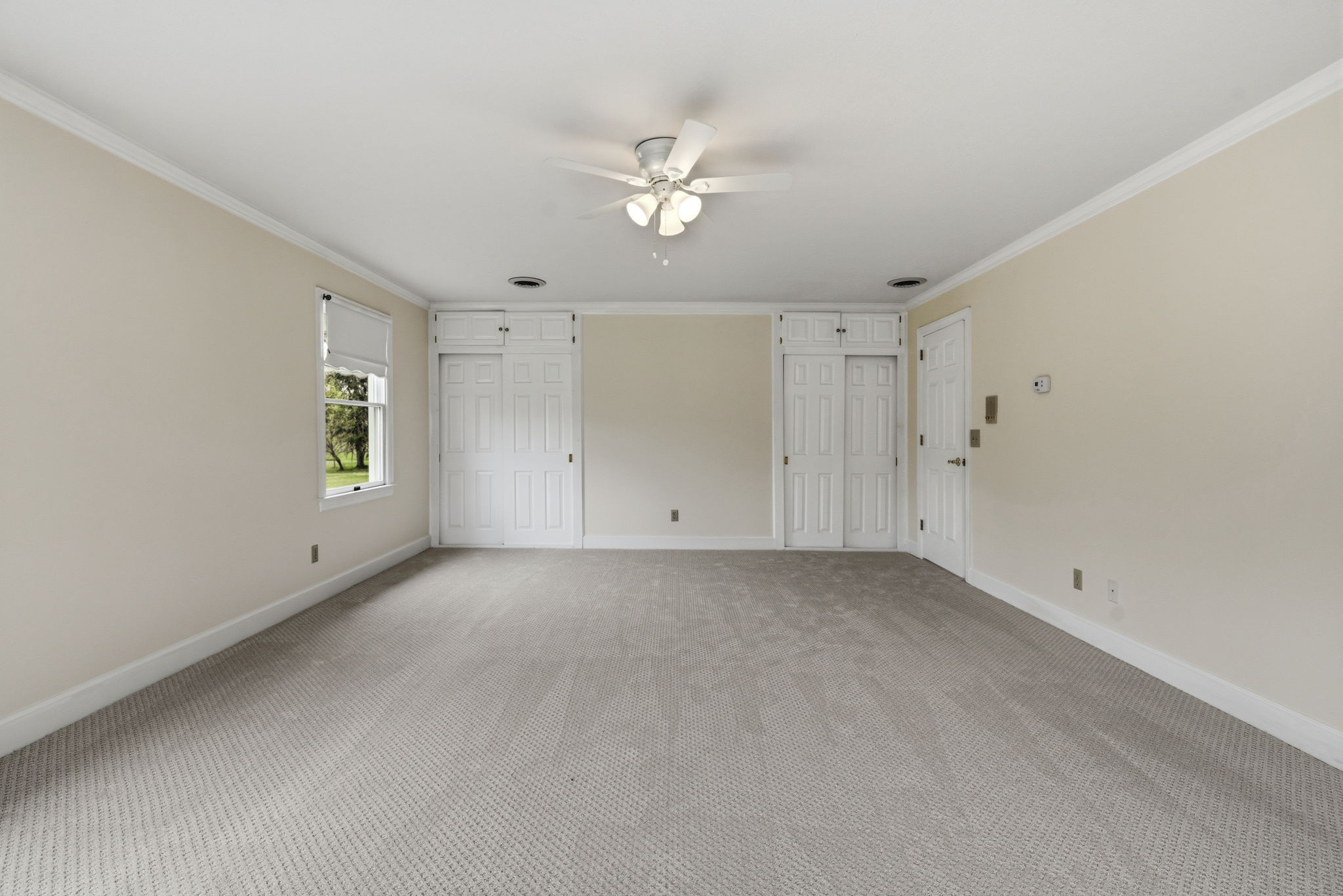 5300 Highway 31W Portland, TN 37148 - Photo 39 of 83 a view of a livingroom with a ceiling fan and window