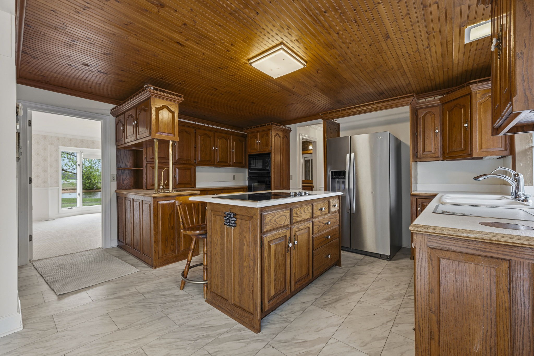 5300 Highway 31W Portland, TN 37148 - Photo 46 of 83 a kitchen with refrigerator and cabinets