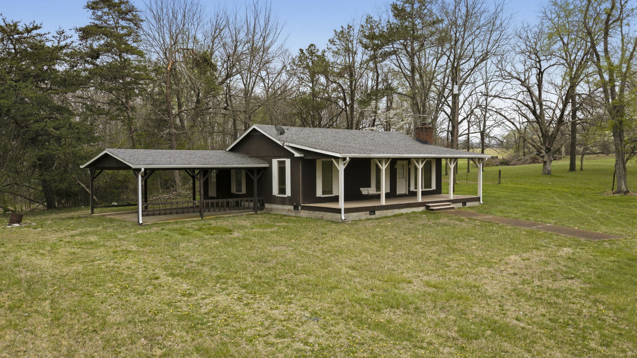 5300 Highway 31W Portland, TN 37148 - Photo 72 of 83 a backyard of a house with table and chairs