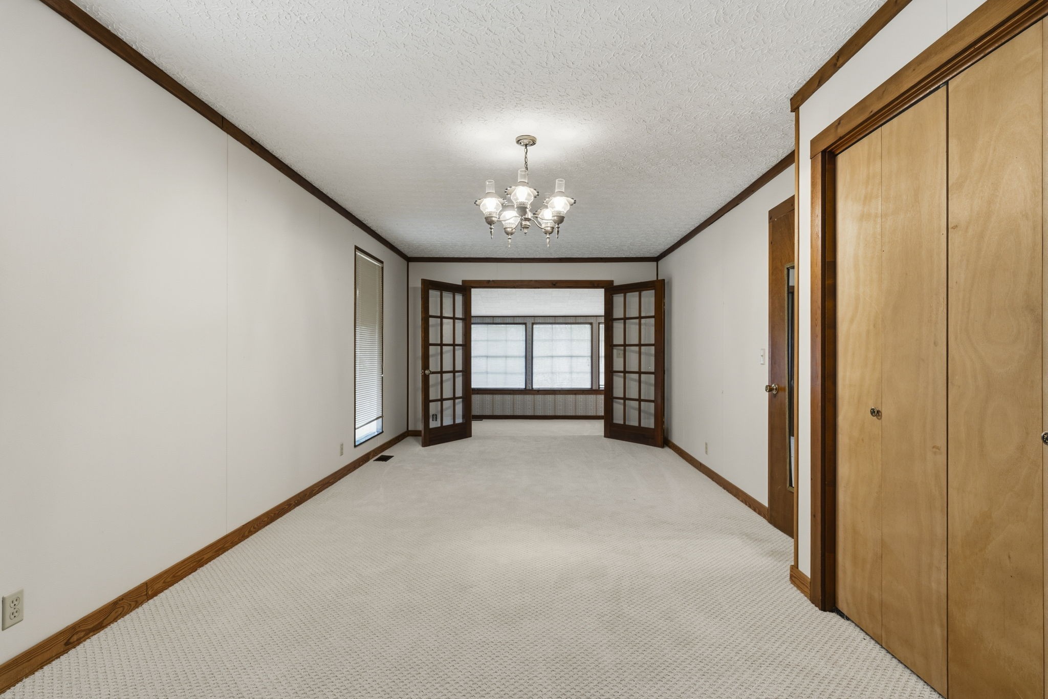 5300 Highway 31W Portland, TN 37148 - Photo 80 of 83 an empty room with windows and chandelier