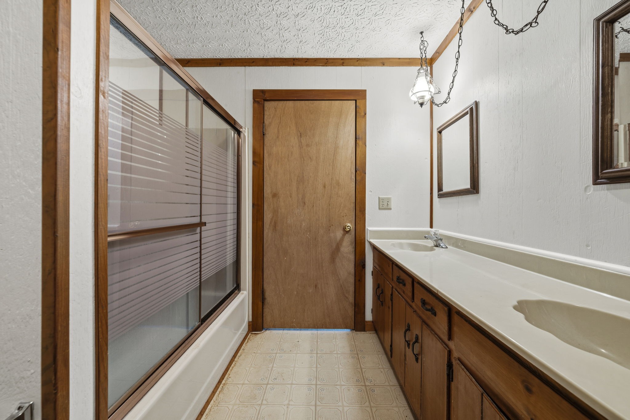 5300 Highway 31W Portland, TN 37148 - Photo 83 of 83 a bathroom with a double vanity sink and mirror
