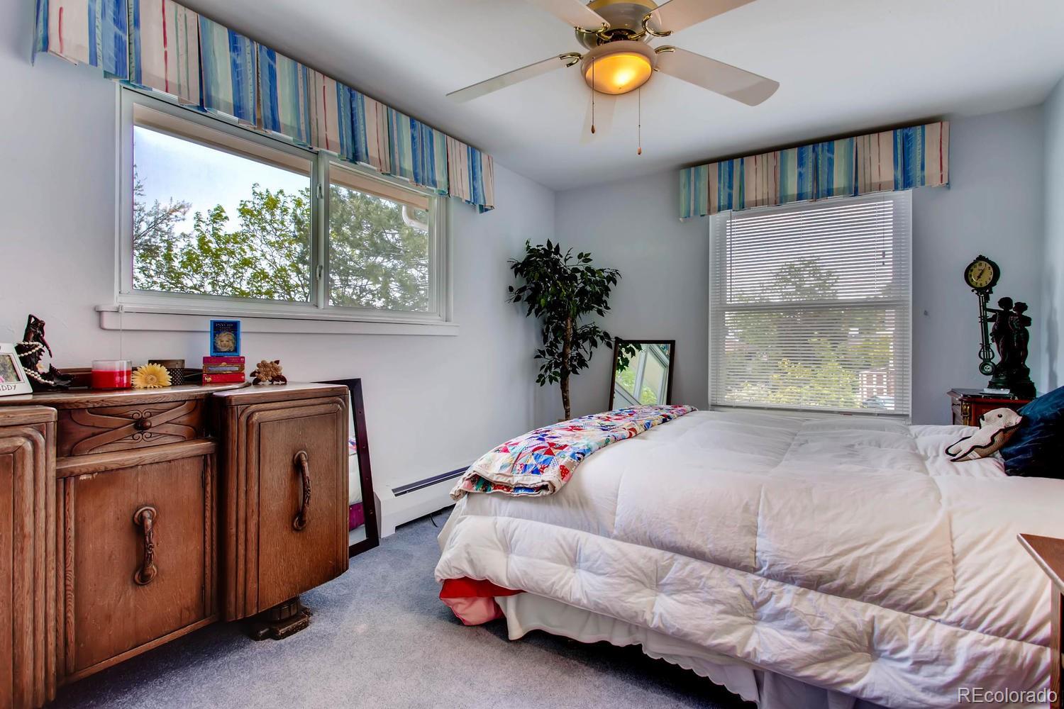 1926 Foothills Road Golden, CO 80401 - Photo 20 of 28 a bed room with a bed and a window
