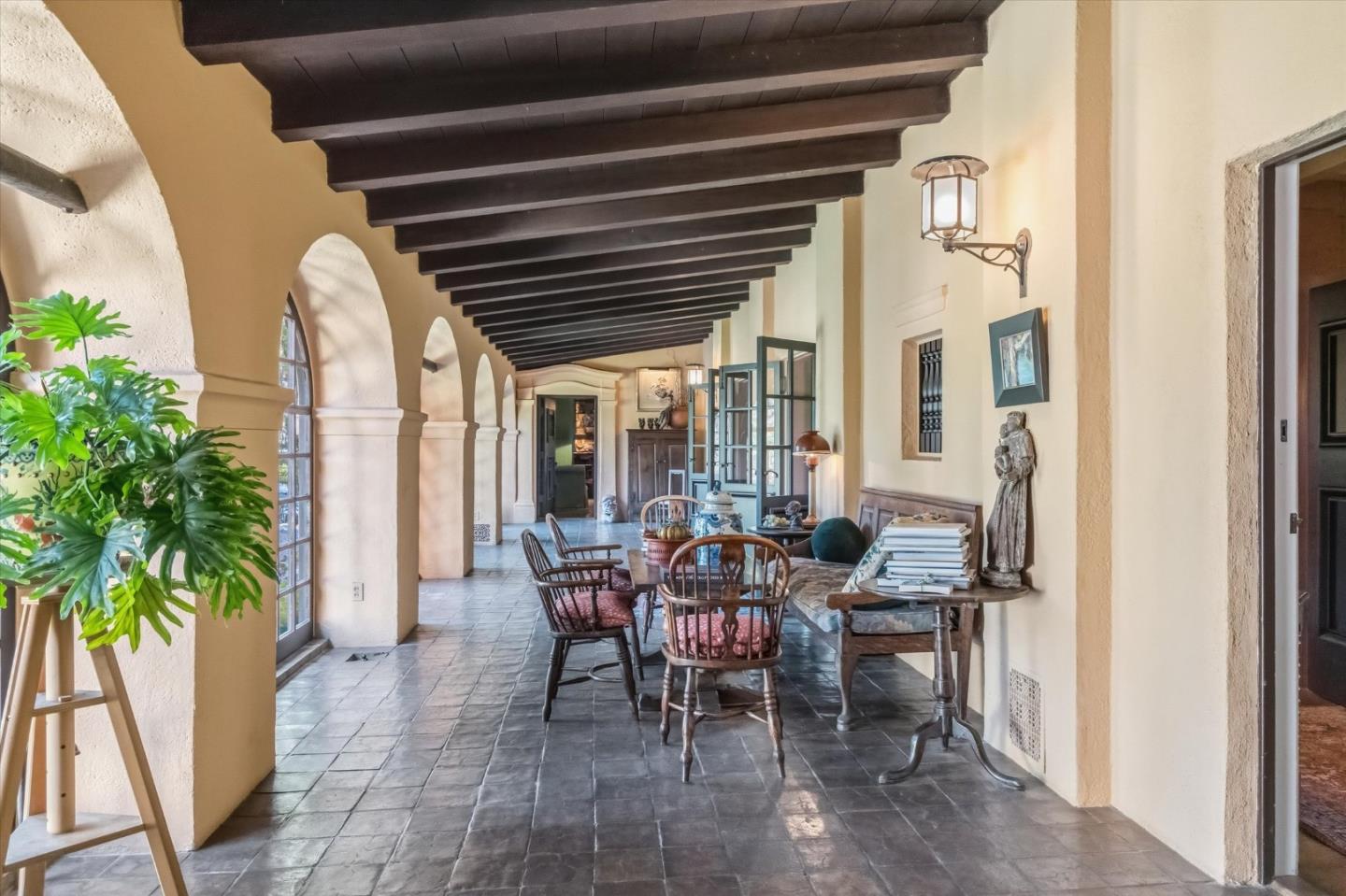 18000 Overlook Road Los Gatos, CA 95030 - Photo 15 of 78 a view of a dining room with furniture and floor to ceiling window