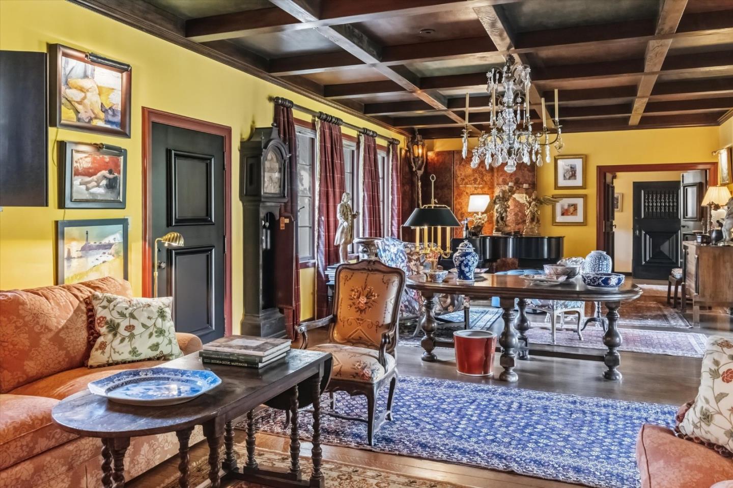 18000 Overlook Road Los Gatos, CA 95030 - Photo 21 of 78 a living room with lots of furniture and a chandelier