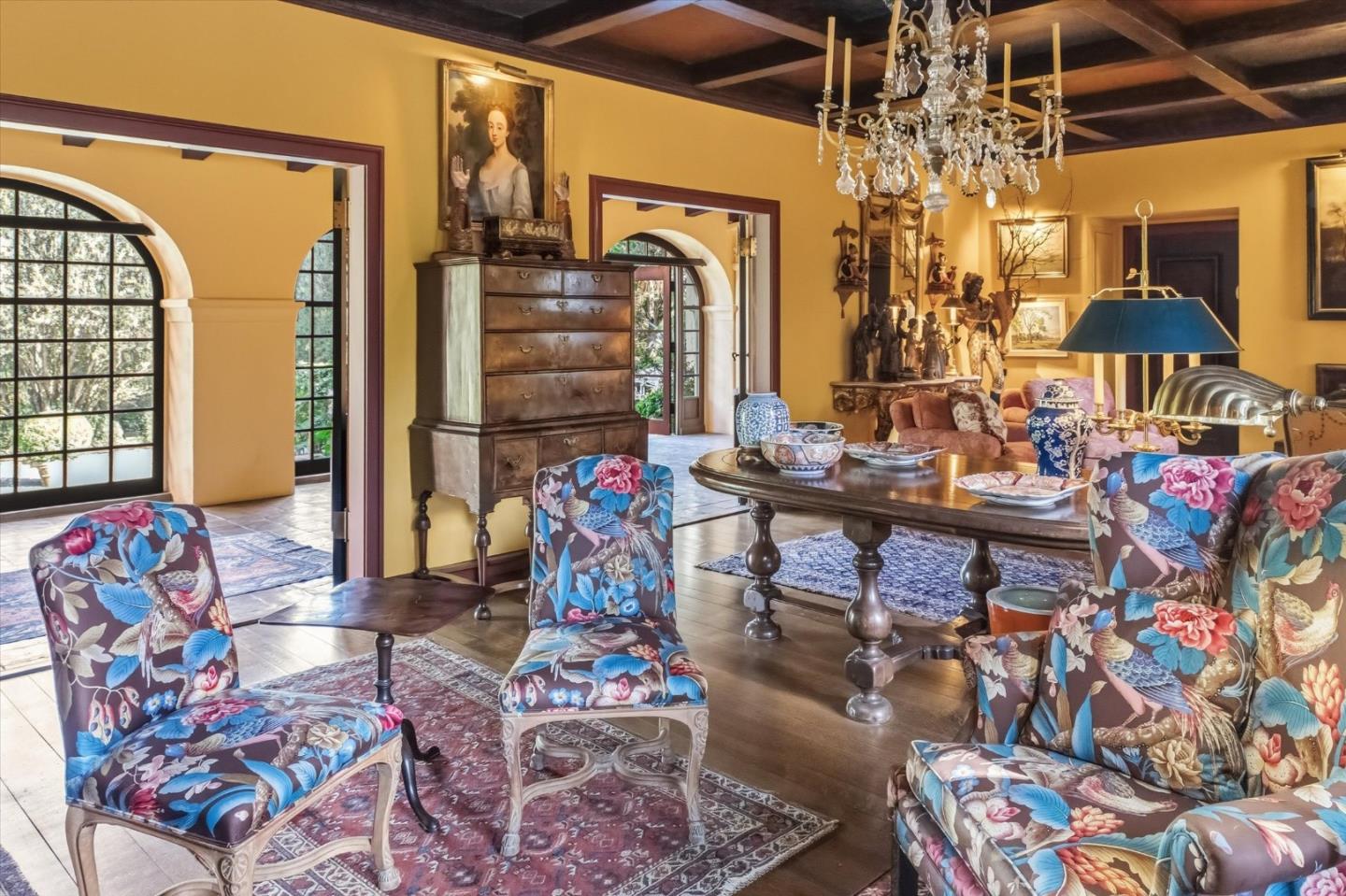 18000 Overlook Road Los Gatos, CA 95030 - Photo 22 of 78 a living room with patio furniture and a chandelier