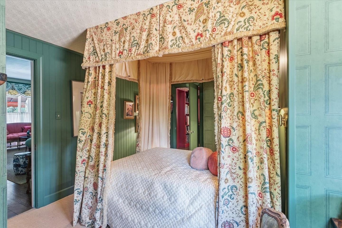 18000 Overlook Road Los Gatos, CA 95030 - Photo 37 of 78 a bedroom with a bed and a chandelier