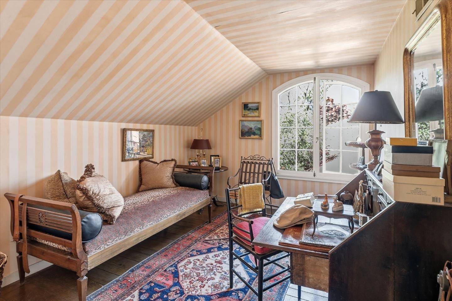 18000 Overlook Road Los Gatos, CA 95030 - Photo 41 of 78 a living room with furniture a table and a chandelier