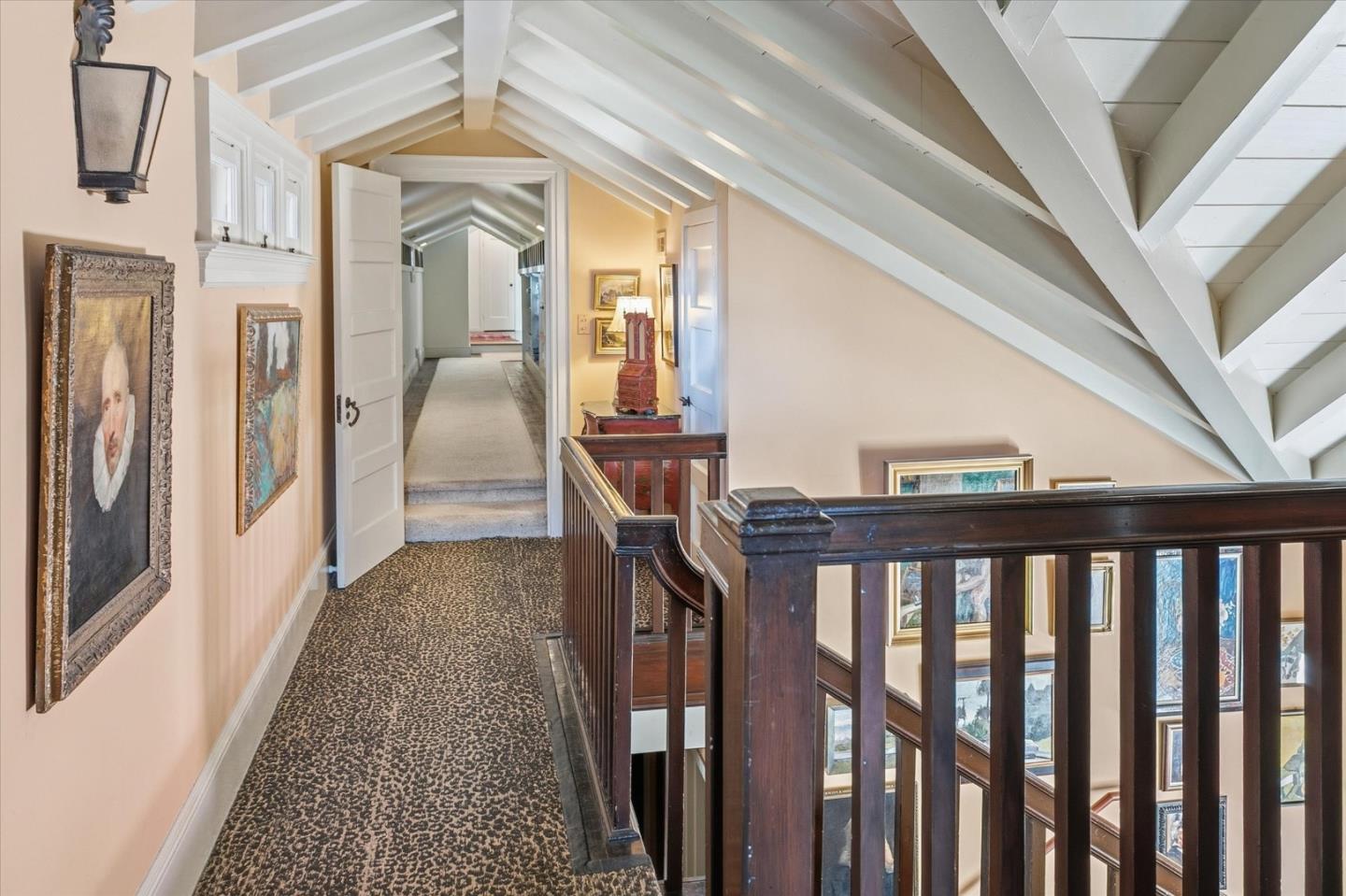 18000 Overlook Road Los Gatos, CA 95030 - Photo 45 of 78 a view of a hallway with wooden floor and stairs