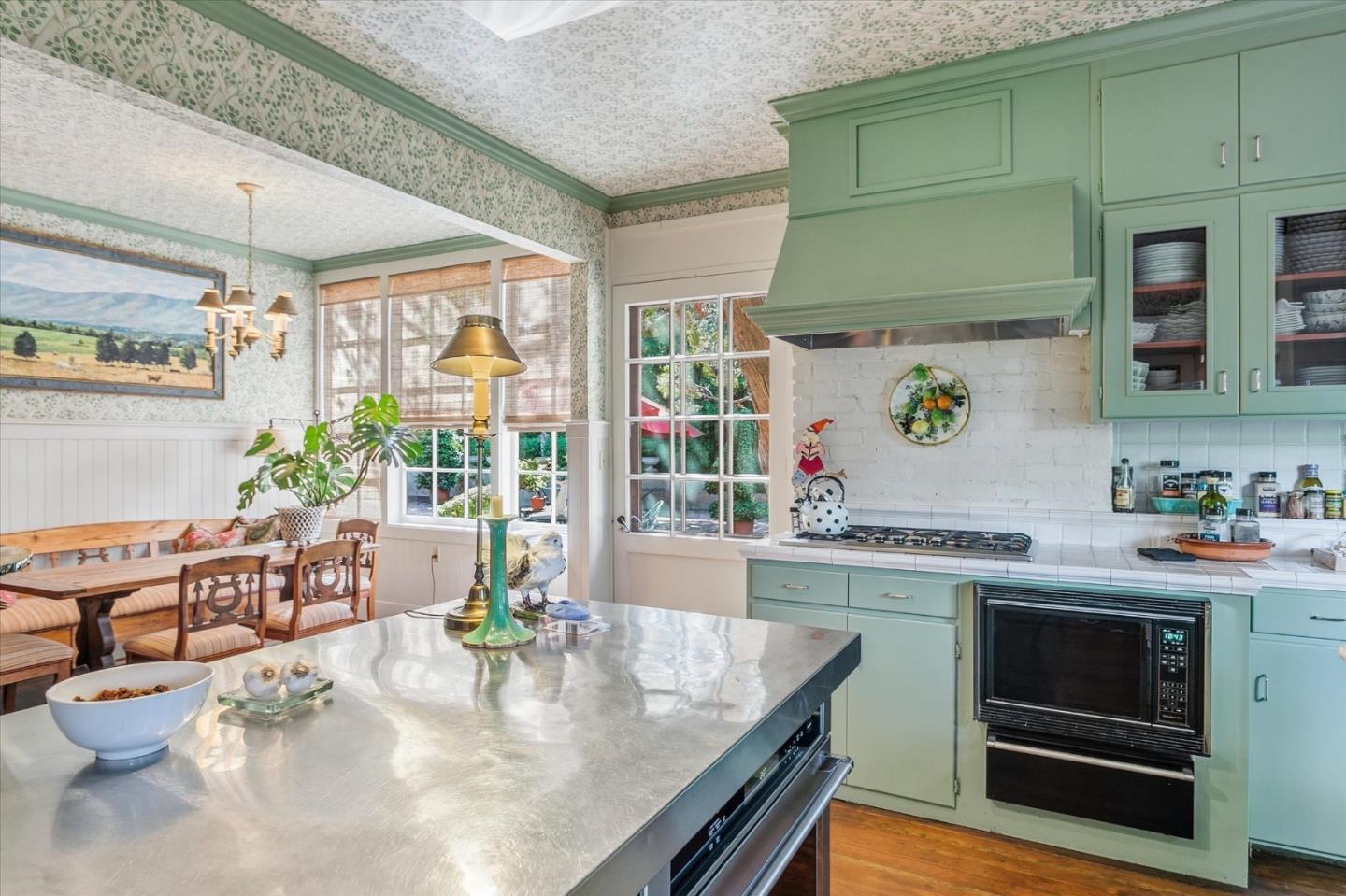 18000 Overlook Road Los Gatos, CA 95030 - Photo 46 of 78 a kitchen with a stove a sink and cabinets