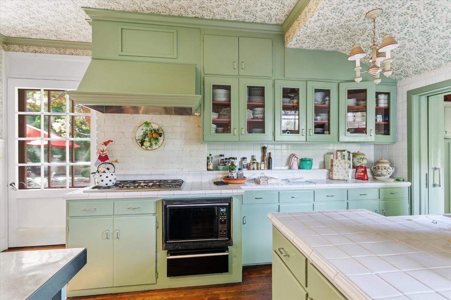 18000 Overlook Road Los Gatos, CA 95030 - Photo 47 of 78 a kitchen with a sink cabinets and window