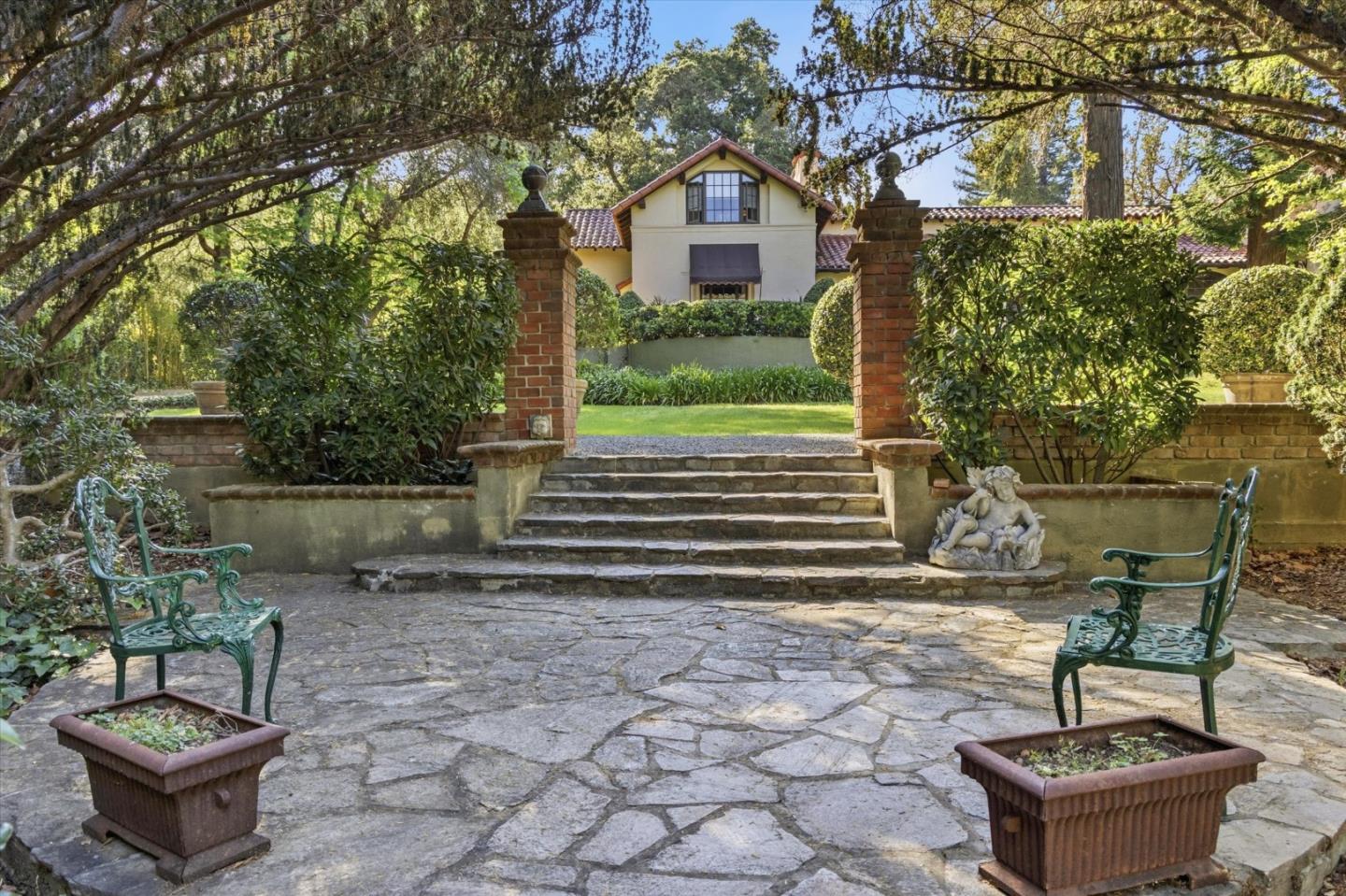 18000 Overlook Road Los Gatos, CA 95030 - Photo 65 of 78 a view of a chairs and table in backyard