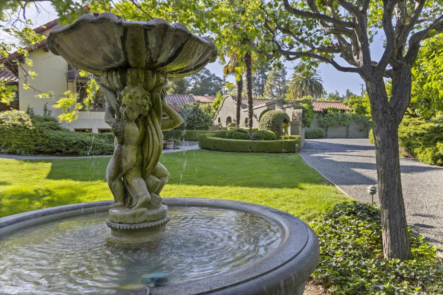 18000 Overlook Road Los Gatos, CA 95030 - Photo 67 of 78 a view of a fountain in the yard with a fountain