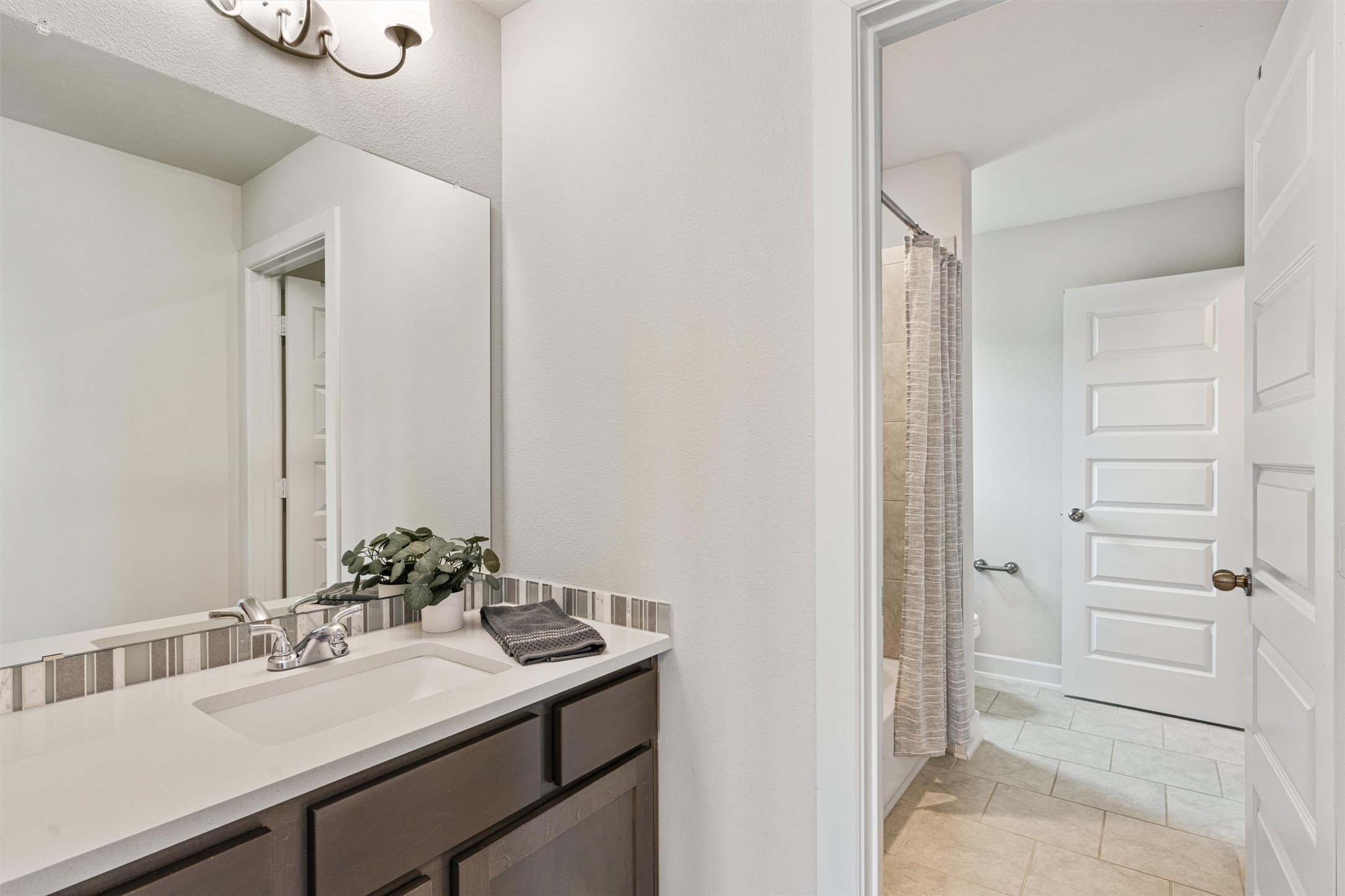 108 Rio Vista Drive Georgetown, TX 78626 - Photo 29 of 40 a bathroom with a sink and a mirror