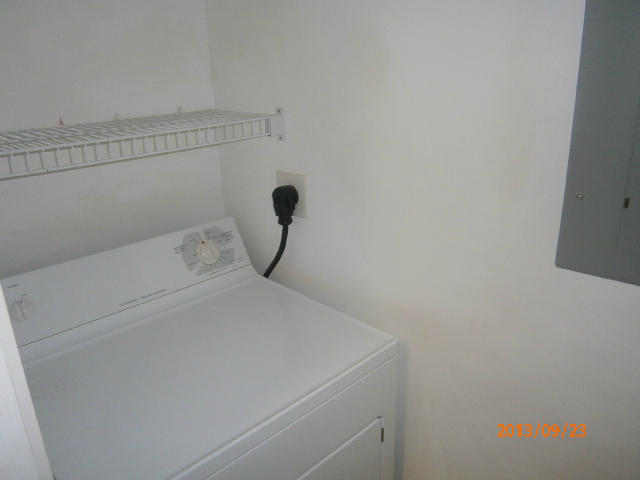 10312 Fox Trail Road South, Unit 1014 West Palm Beach, FL 33411 - Photo 8 of 12 a utility room with dryer and washer