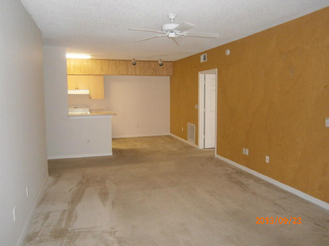 10312 Fox Trail Road South, Unit 1014 West Palm Beach, FL 33411 - Photo 10 of 12 an empty room with windows and closet