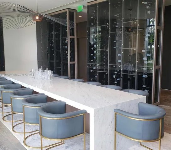 a view of a living room and dining room