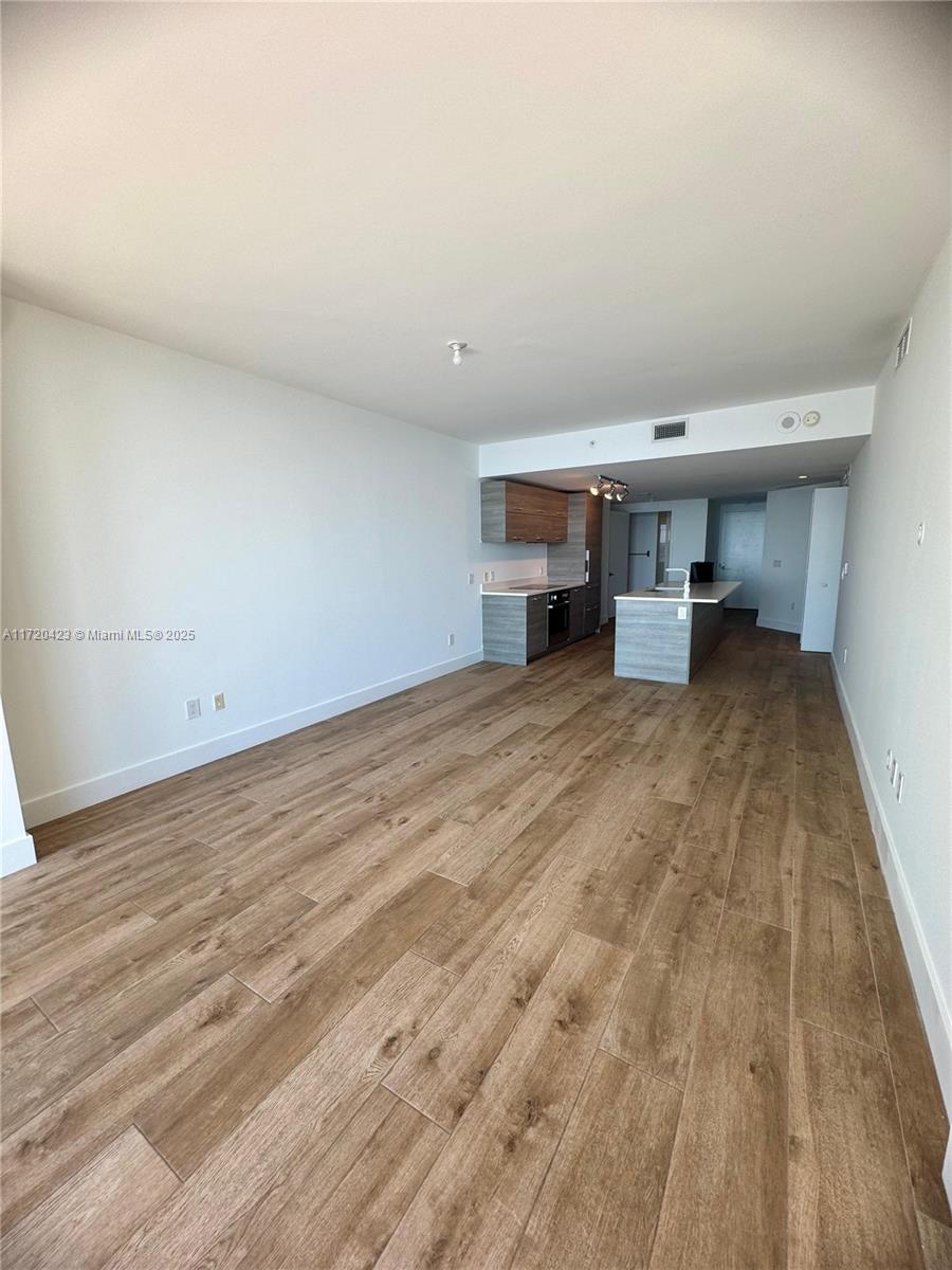 650 Northeast 32nd Street, Unit 1805 Miami, FL 33137 - Photo 7 of 21 wooden floor in a room