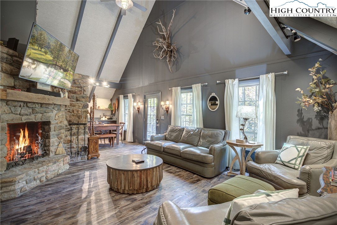 2950 Hickory Boone, NC 28607 - Photo 11 of 26 a living room with furniture and a fireplace