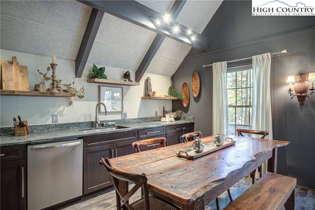 2950 Hickory Boone, NC 28607 - Photo 13 of 26 a kitchen with granite countertop a sink and wooden floor