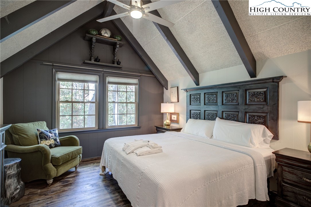 2950 Hickory Boone, NC 28607 - Photo 18 of 26 a bedroom with a bed couch and window