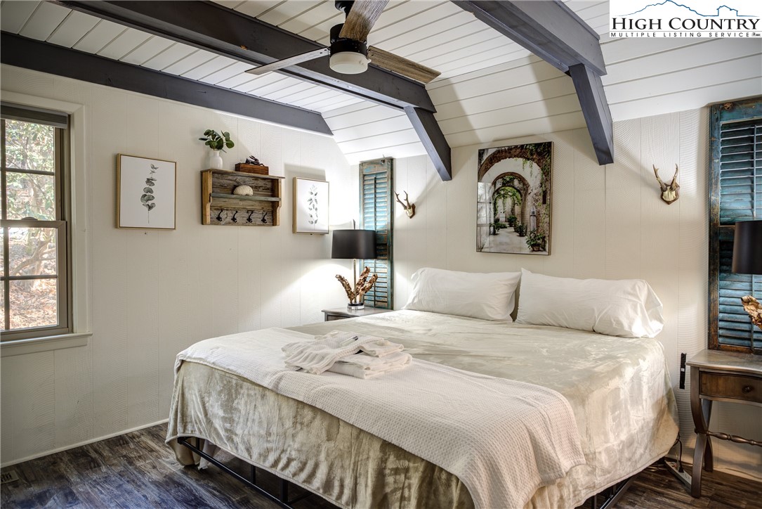 2950 Hickory Boone, NC 28607 - Photo 22 of 26 a bedroom with a bed and a window