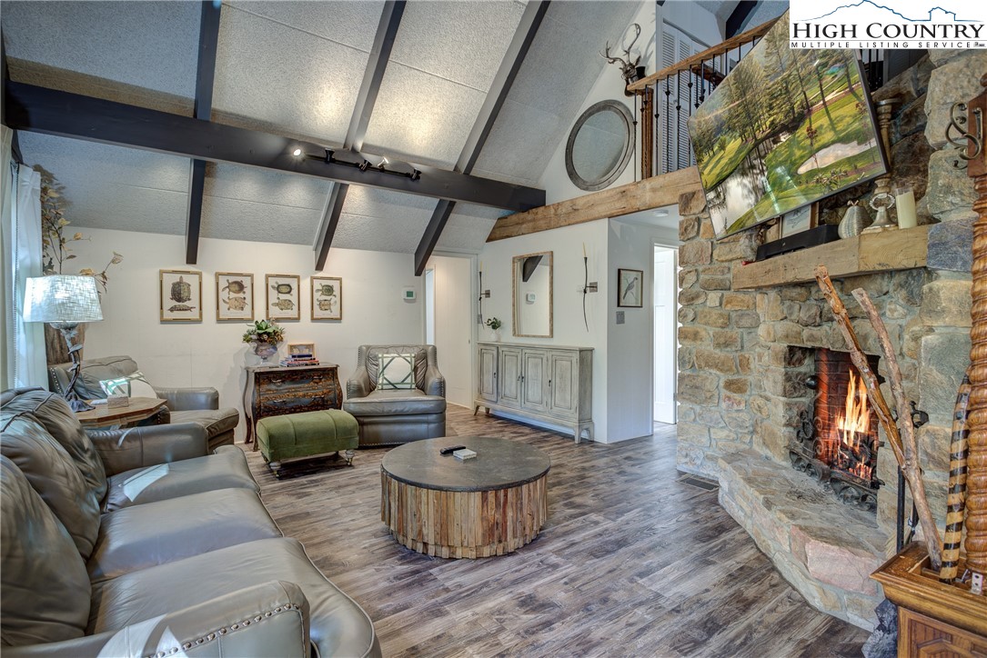 2950 Hickory Boone, NC 28607 - Photo 10 of 26 a living room with furniture and a fireplace