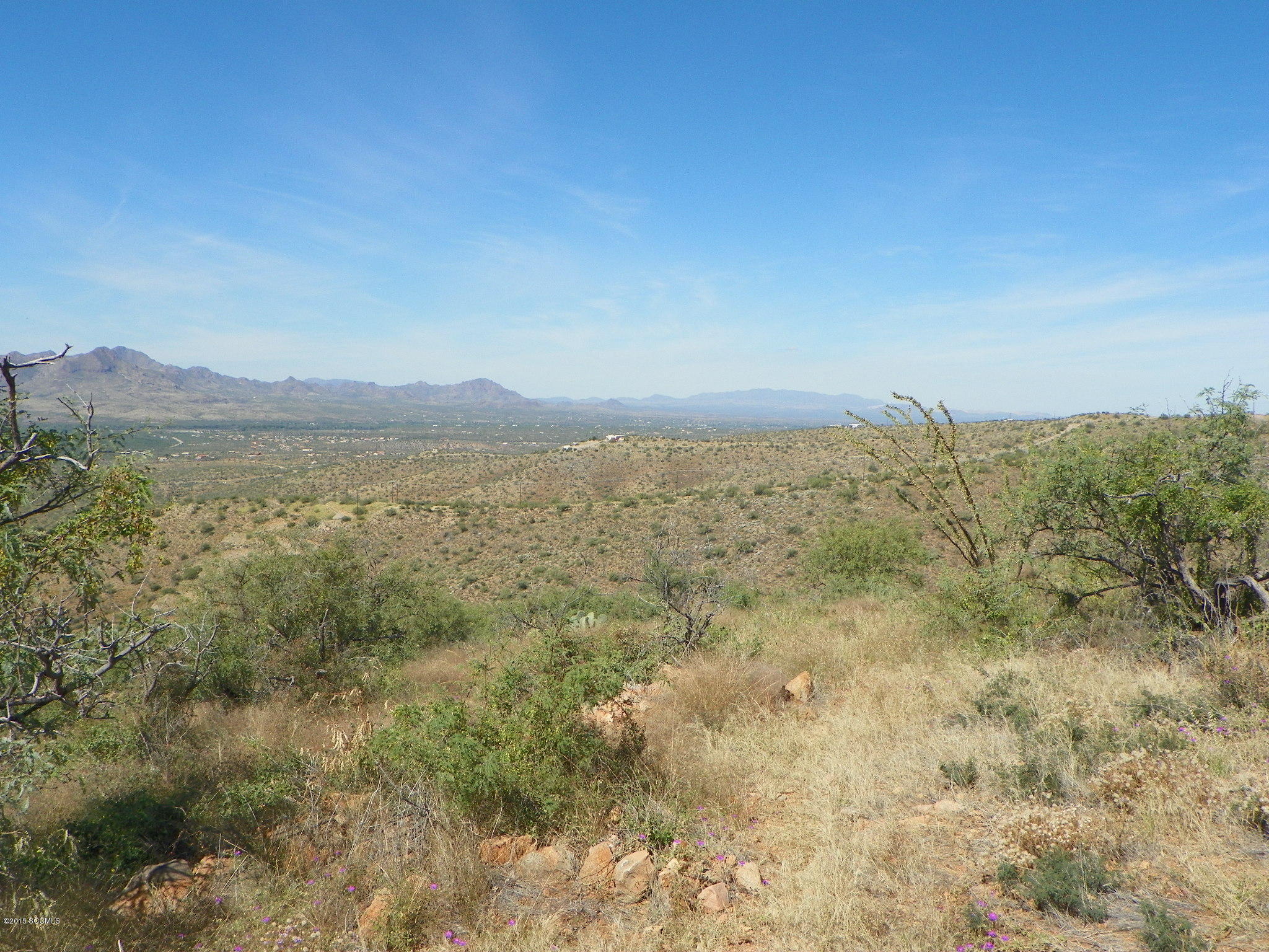 1523 Pirana Court Rio Rico, AZ 85648 - Photo 8 of 13 a view of an lake and mountain