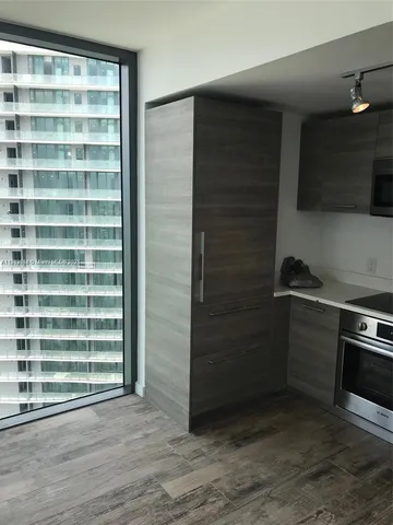 a bathroom with a bathtub and a sink