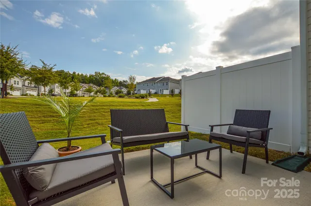 a view of a chairs and table on the terrace