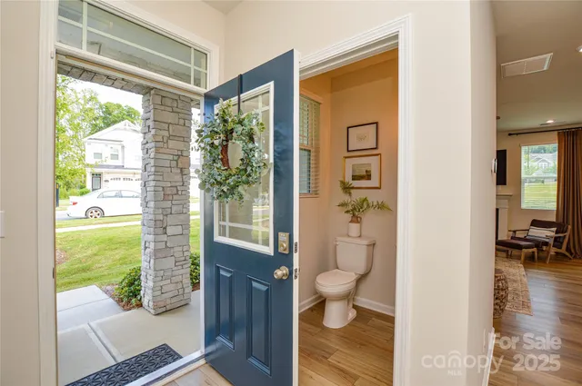 a bathroom with a toilet sink and a shower