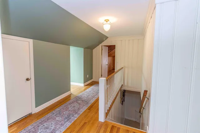 a view of hallway with stairs