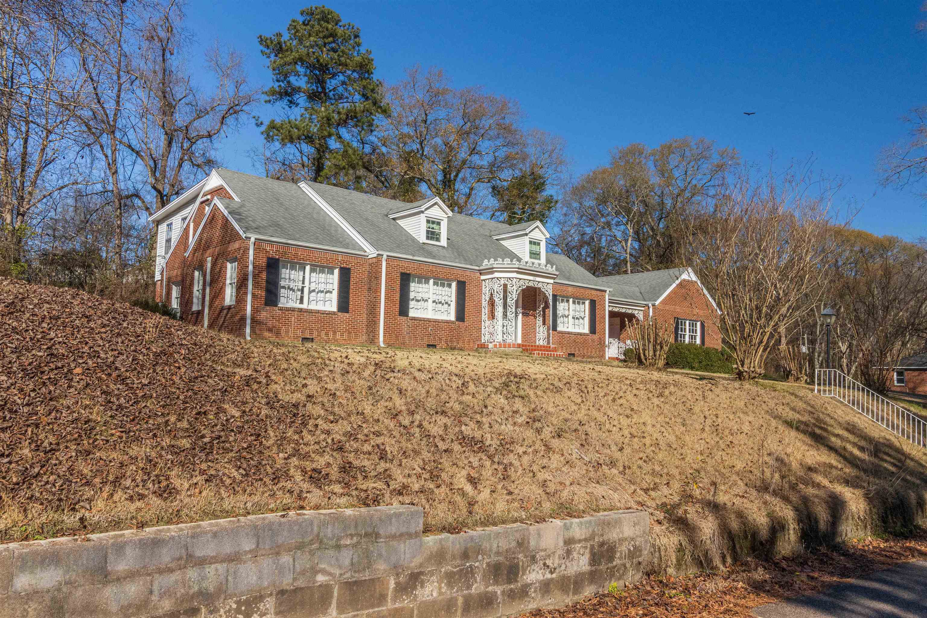 228 North 3rd Street Selmer, TN 38375 - Photo 2 of 33 a front view of a house with a yard