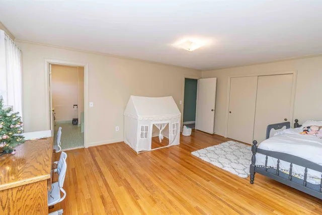 a view of a room with windows