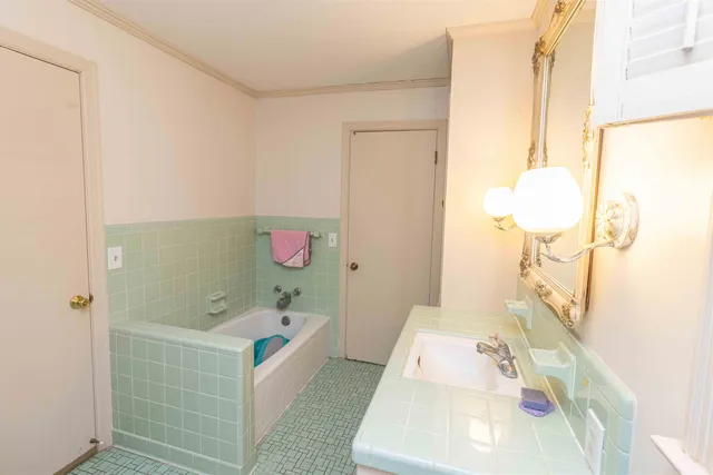 a view of a utility room with a sink