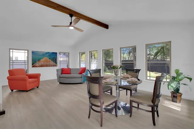 a living room with furniture and a window