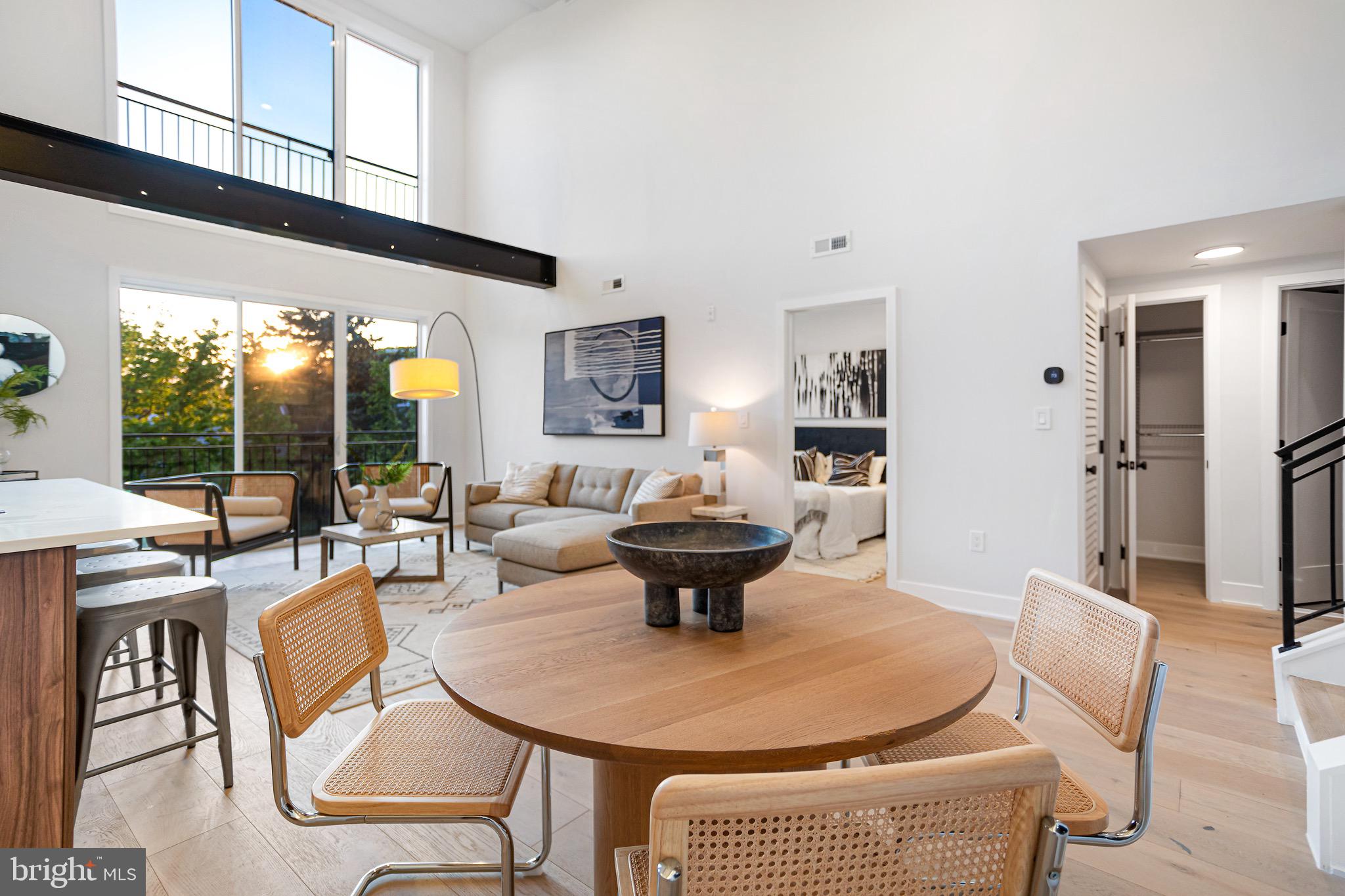 845 19th Street Northeast, Unit PH10 Washington, DC 20002 - Photo 10 of 21 a view of a dining room with furniture window and outside view