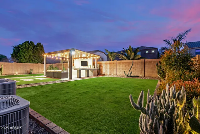 a view of an apartment with a big yard