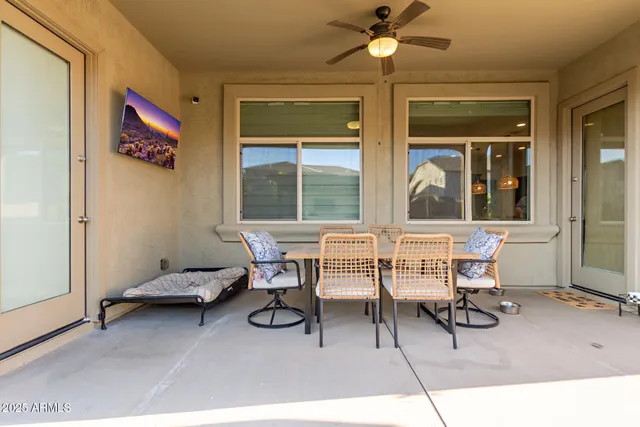 a view of a house with a backyard and a garden